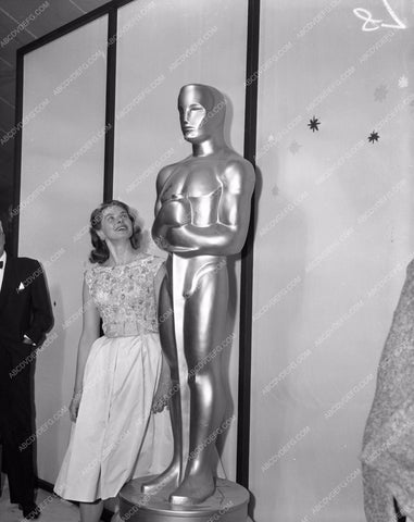 1958 Oscars Ingrid Bergman and giant statue Academy Awards aa1958-65</br>Los Angeles Newspaper press pit reprints from original 4x5 negatives for Academy Awards.