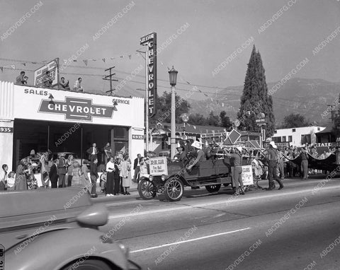 parade with vintage firetruck and Chevrolet Dealership cars-89