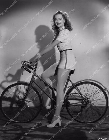 cute Freda Lansley gets ready to take her bike out for a spin 8b20-0243