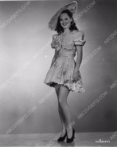 Lucia Carroll in super cool newspaper skirt top and hat 8b20-0399
