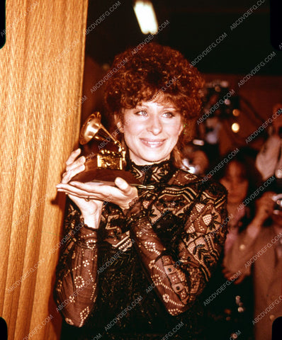 Barbra Streisand and her mini phonograph award 8b20-10110