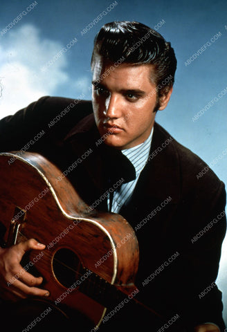 Elvis Presley and his guitar 8b20-10152