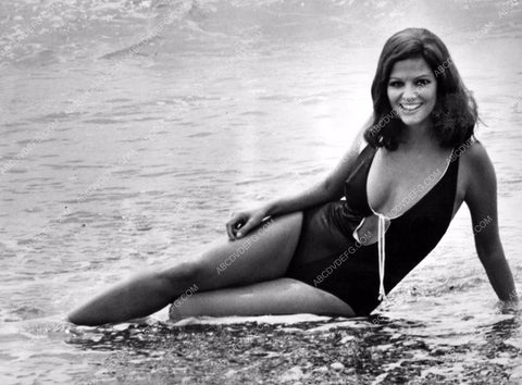 Claudia Cardinale sitting in the waves 8b20-10488