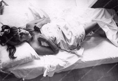 Claudia Cardinale taking a nap by the window 8b20-10489