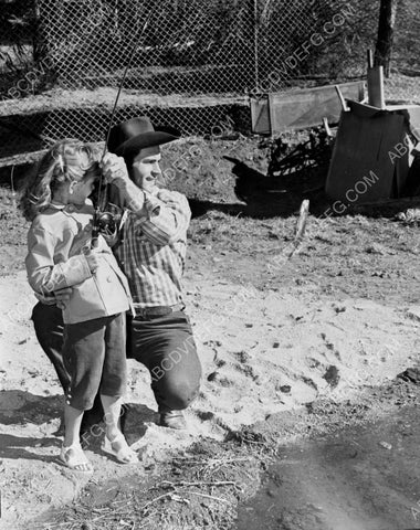 Clint Walker and his daughter do a little fishing 8b20-10693