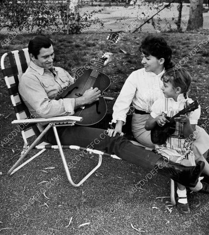 Clint Walker and guitar with the family in the backyard 8b20-10733