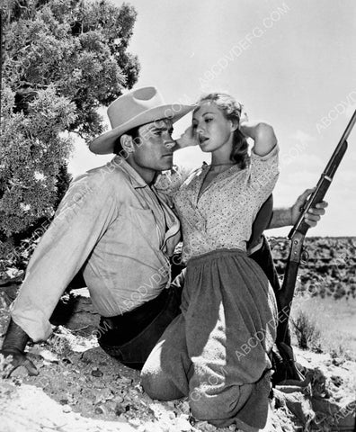 Clint Walker his rifle and some sexy babe 8b20-10741