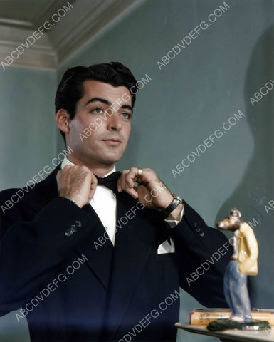 Rory Calhoun adjusting his bowtie 8b20-11113