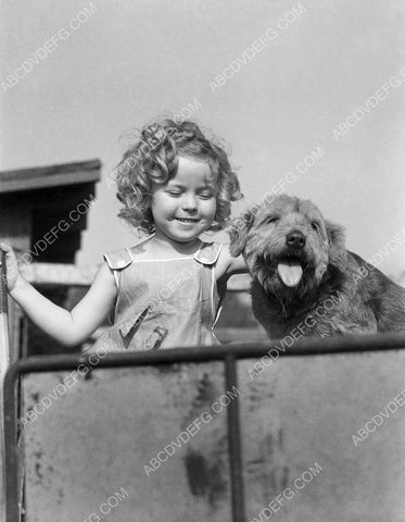 Shirley Temple playing with her cute dog 8b20-1128