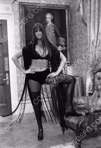 sexy Caroline Munro in thigh high boots 8b20-11480