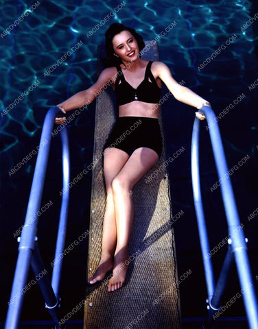 Barbara Stanwyck laying on the diving board 8b20-11791
