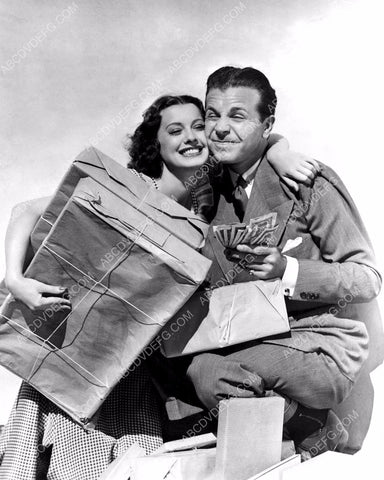 Ellen Drew Dick Powell some packages and a wad of money 8b20-11989
