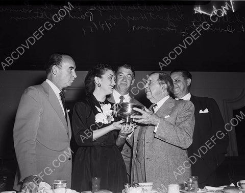 Dorothy Lamour getting some award cup 8b20-12217
