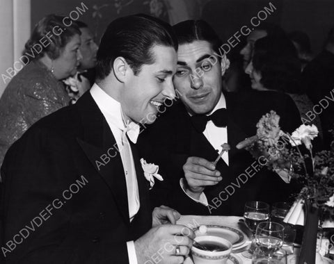 Don Ameche Tyrone Power talking at the dinner table 8b20-12565