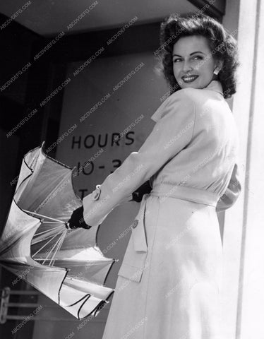Frances Gifford in winter fashion w umbrella 8b20-12601