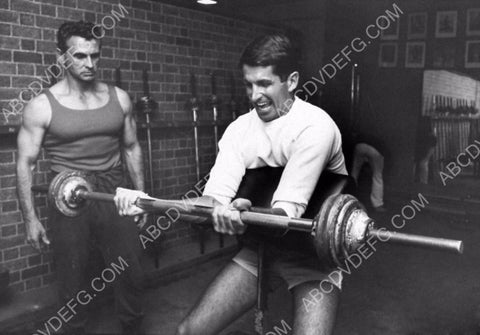 George Hamilton and friend exercising with weights 8b20-12929