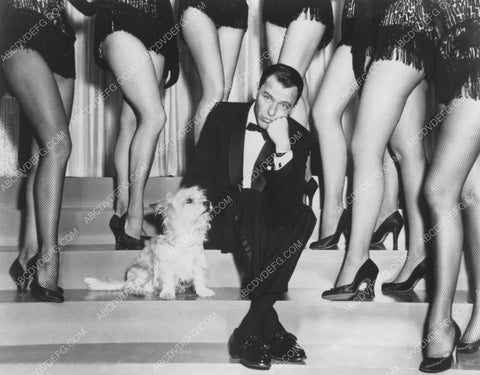 Frank Sinatra sitting between legs in fishnets 8b20-12968