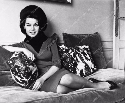 Annette Funicello sitting on the sofa 8b20-13093