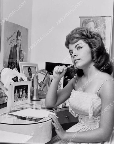 Annette Funicello composing a letter at her desk 8b20-13160