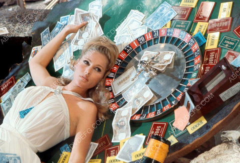 sexy Ursula Andress laying on roulette table w money Casino Royale 8b20-13207