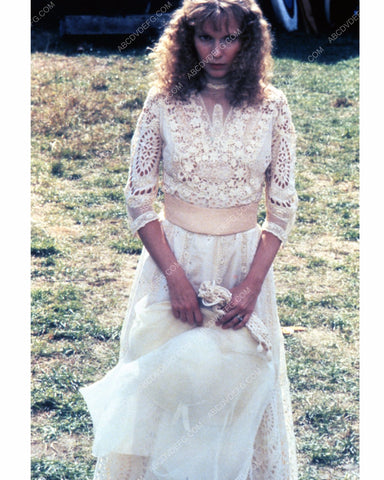 Mia Farrow standing in the grass film The Great Gatsby 8b20-13556