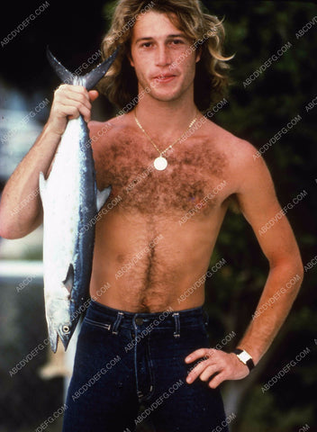 Andy Gibb shows off his fishing catch 8b20-13724