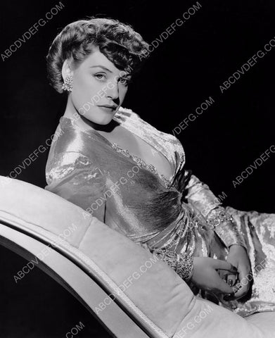 Kaaren Verne shiney dress on chaise lounge 8b20-1544