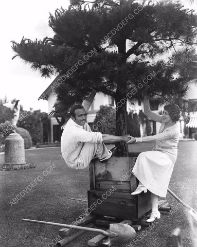 Douglas Fairbanks Sr Mary Pickford planting a tree in the backyard at Pickfair 8b20-16001