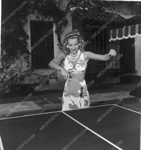 Carole Landis returning a fierce ping pong shot 8b20-17090