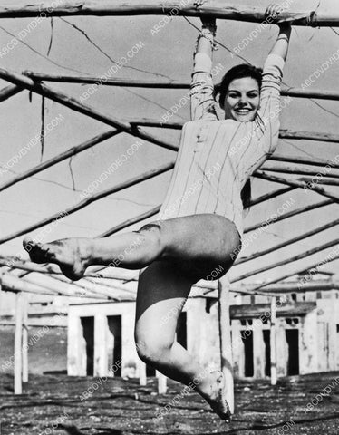 Claudia Cardinale playing in the garden 8b20-17138