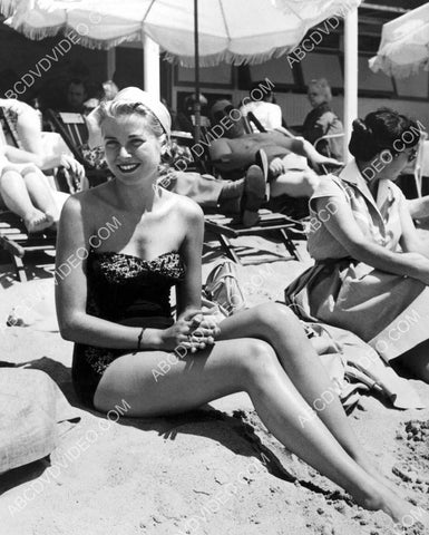 Grace Kelly on the beach w her toes in the sand 8b20-17589