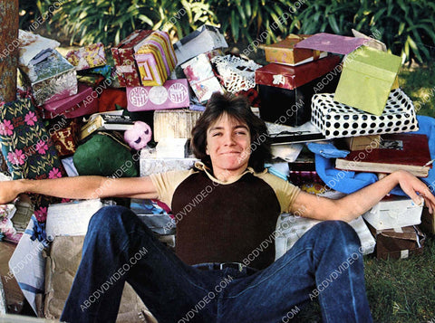 David Cassidy laying among his presents 8b20-17892