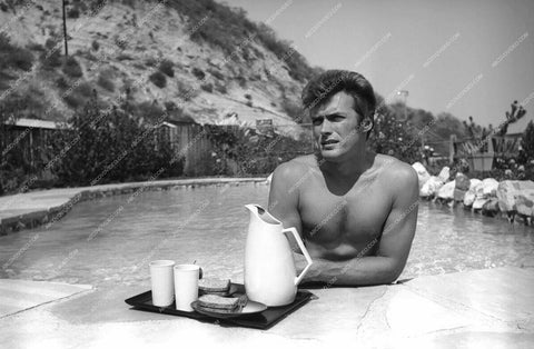 Clint Eastwood having lunch in the pool 8b20-17961