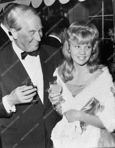 Maurice Chevalier and hayley Mills at a party 8b20-18118
