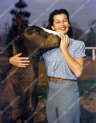 Gail Russell posing w a pony 8b20-18373