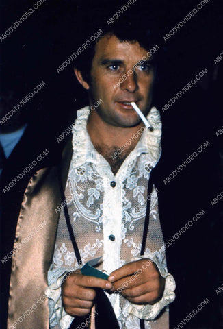 James Stacy lighting up a cigarette 8b20-18489