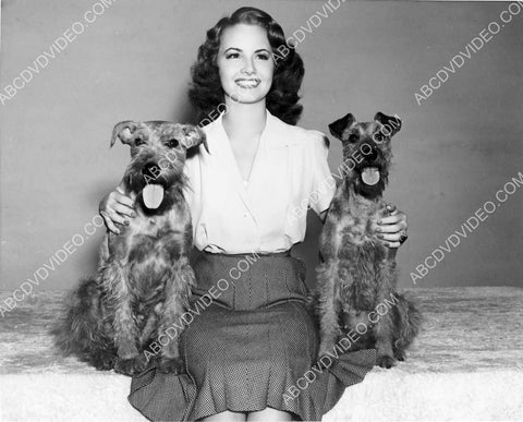 Janet Blair posing with her dogs 8b20-18609