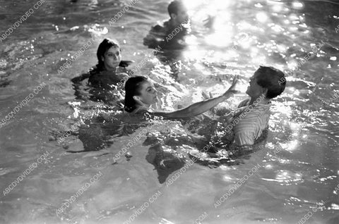 Patti Chandler in the swimming pool w the gang 8b20-18839