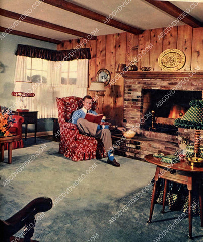 Marshall Thompson reading a book by the fire 8b20-19961
