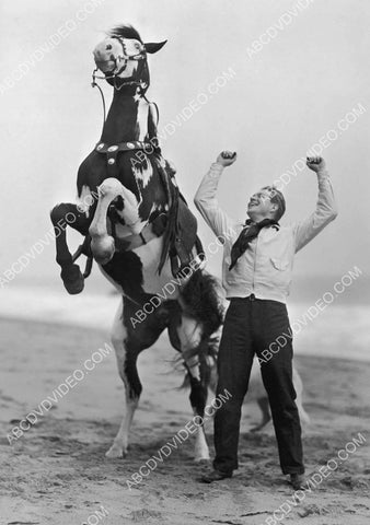 Nelson Eddy and a horse on the beach 8b20-20004