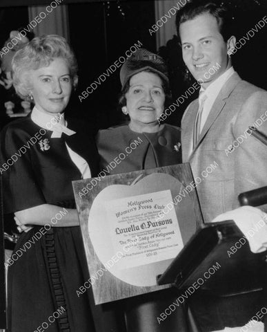 Barbara Stanwyck and Pat Boone present Louella Parsons with an award 8b20-20284