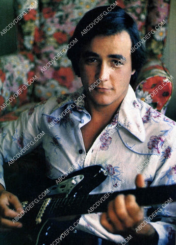 James Carroll Jordan strumming his guitar 8b20-20445