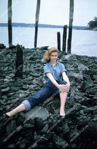 Lee Remick on the rocks by the surf 8b20-20540