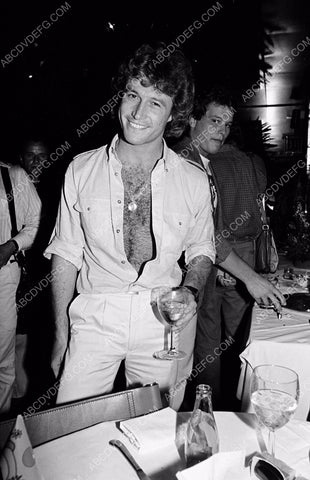 Andy Gibb and a glass of wine 8b20-2054