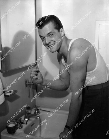 handsome Robert Sterling brushing his teeth 8b20-20754