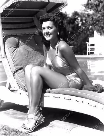 Ann Rutherford does a little sunbathing by the swimming pool 8b20-2400