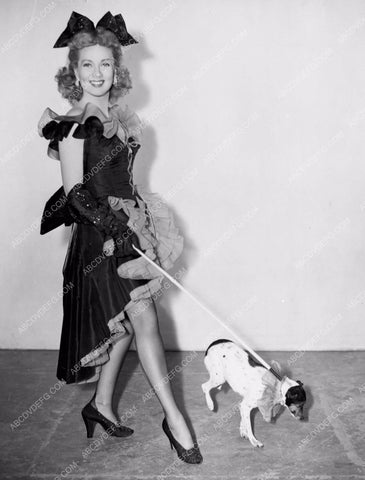 perky Ann Sothern walking her cute little dog 8b20-2438