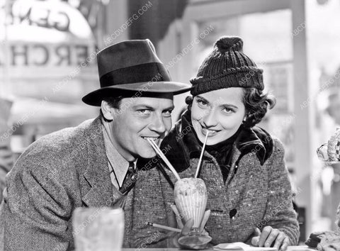 Merle Oberon Joel McCrea share a milk shake film These Three 8b20-2590
