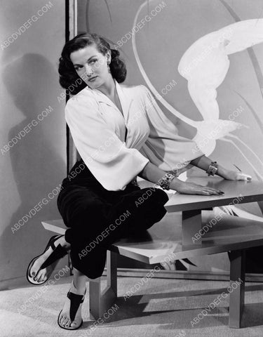 Jane Russell seated on cool end table 8b20-2649