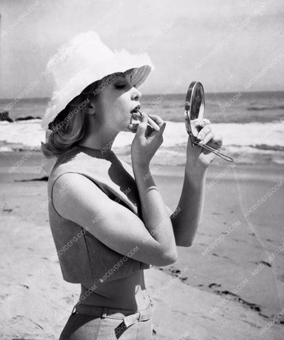 Barbara Eden does makeup check at the beach dp-3274